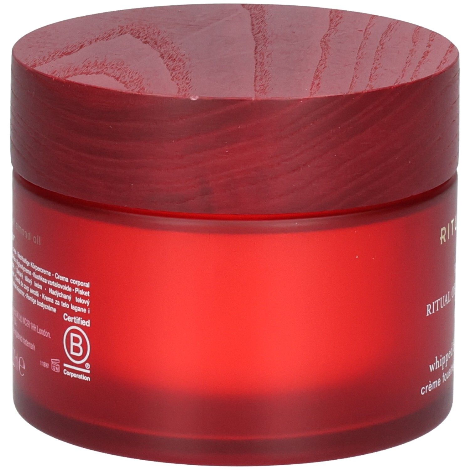 Achterkant van de RITUALS The Ritual of Ayurveda Body Cream pot met ingrediënten en B Corp certificering.
