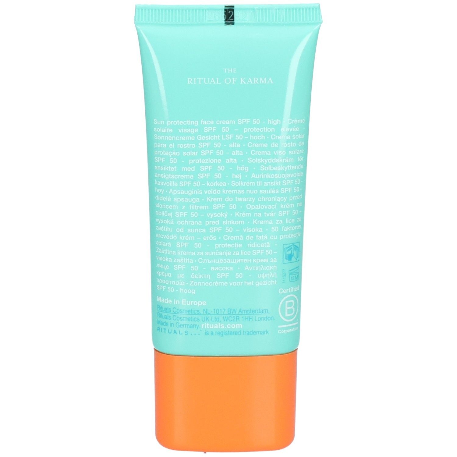 Arrière d'un tube turquoise de crème solaire visage SPF 50. Contient les ingrédients et certifications.