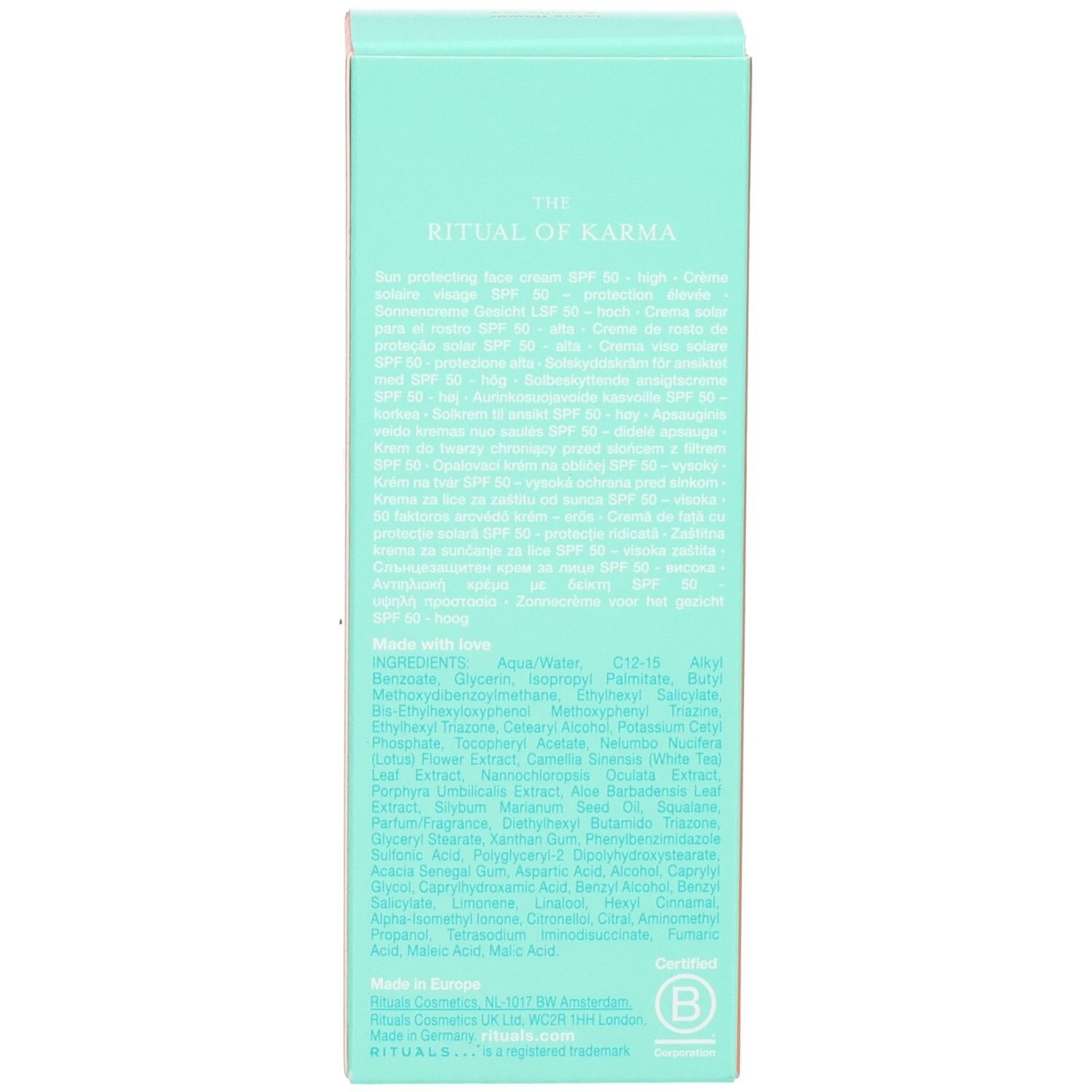 Côté d'une boîte en carton orange pour crème solaire visage.