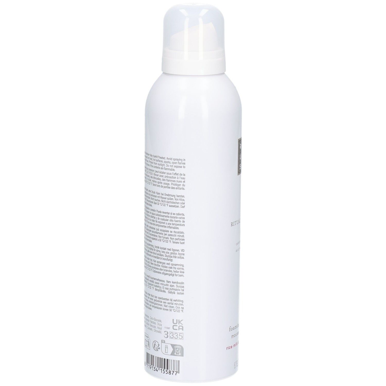 Arrière d'un flacon spray blanc avec informations produit et sceaux.