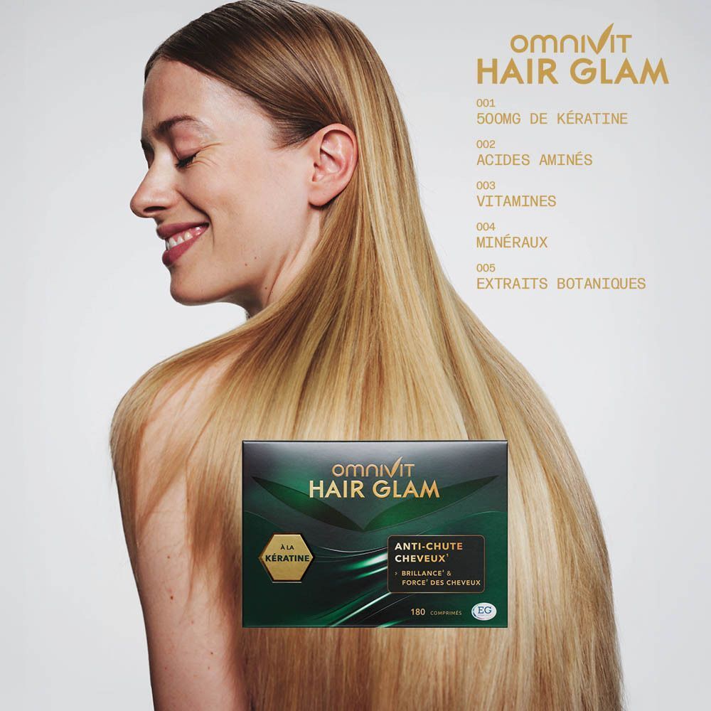 Femme avec de longs cheveux et une boîte Omnivit Hair Glam. Texte: 500mg Kératine, Acides Aminés, Vitamines, Minéraux.