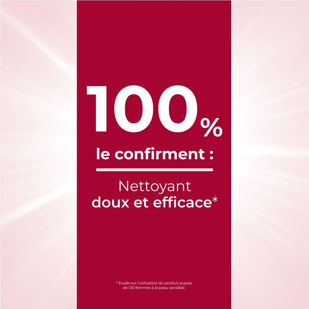 Texte : 100% confirment : nettoyage doux et efficace. Fond rouge. Texte en français.