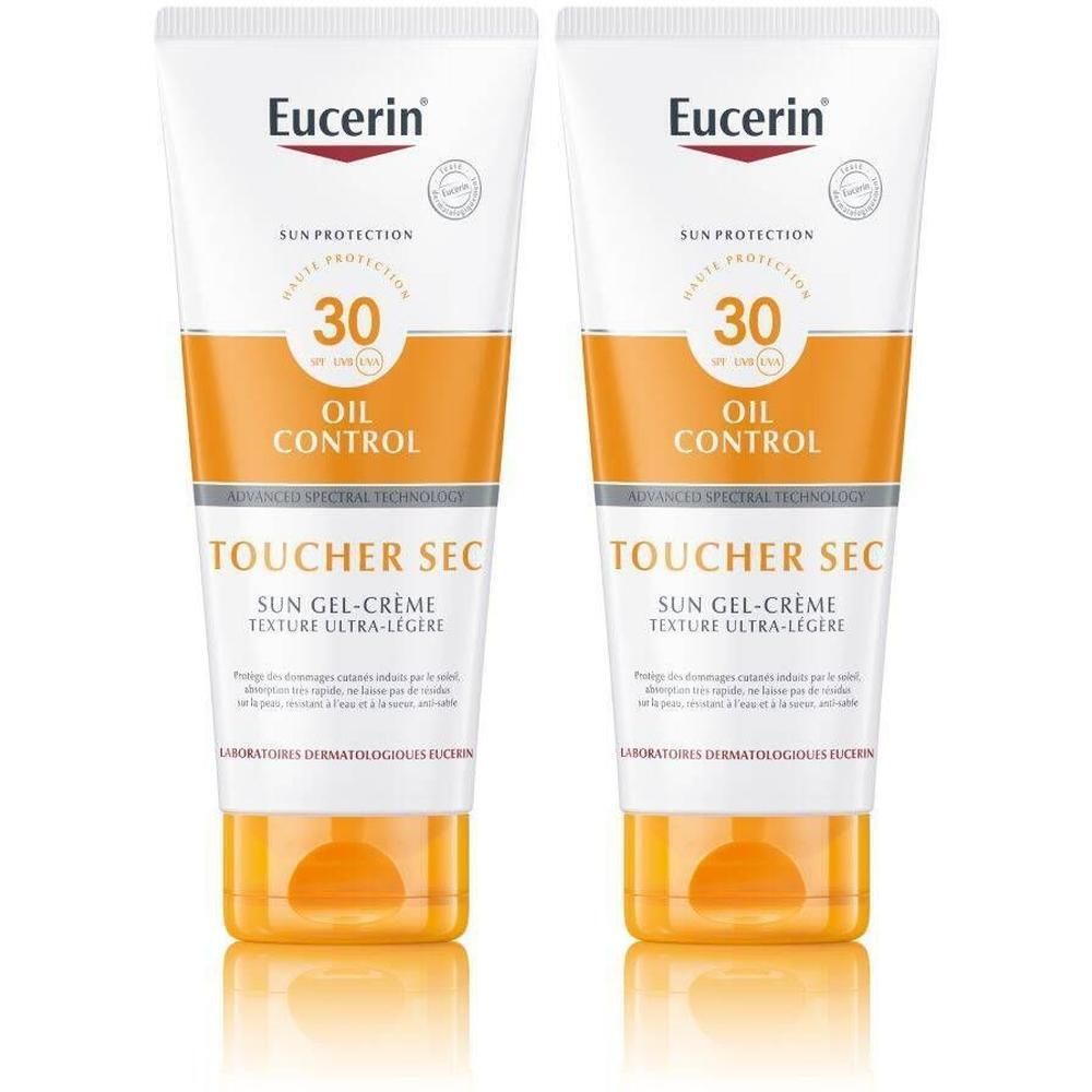Deux tubes Eucerin Sun Sensitive Protect SPF30. Blanc, orange et jaune. Texte : OIL CONTROL, TOUCHER SEC, Texture Ultra-Légère.