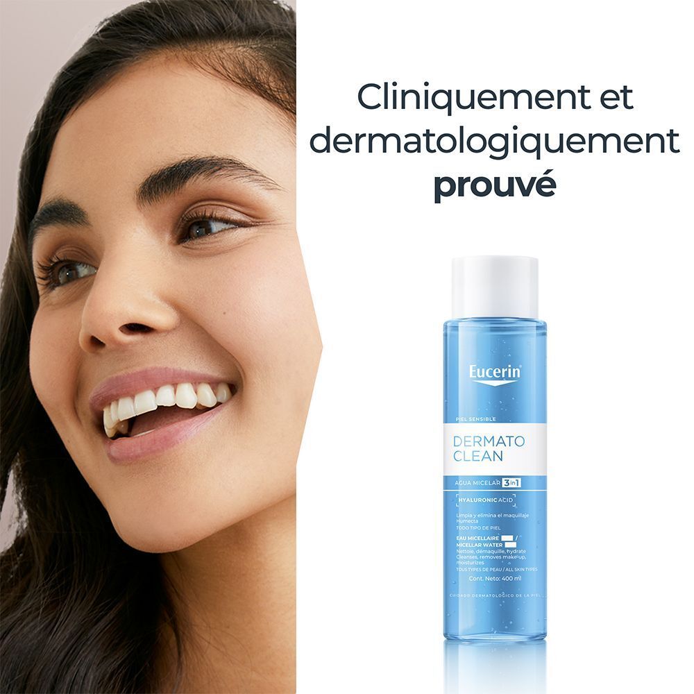 Femme souriante. Eucerin DermatoCLEAN Eau micellaire 3 en 1. Texte: Cliniquement et dermatologiquement prouvé.
