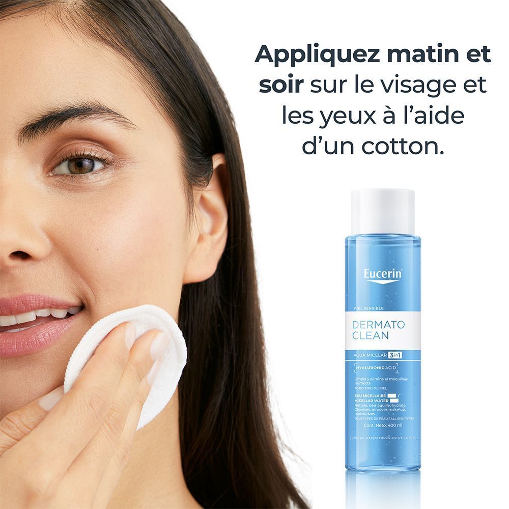 Femme nettoyant son visage avec un coton. Eucerin DermatoCLEAN Eau micellaire 3 en 1. Texte: Appliquez matin et soir sur le visage et les yeux.