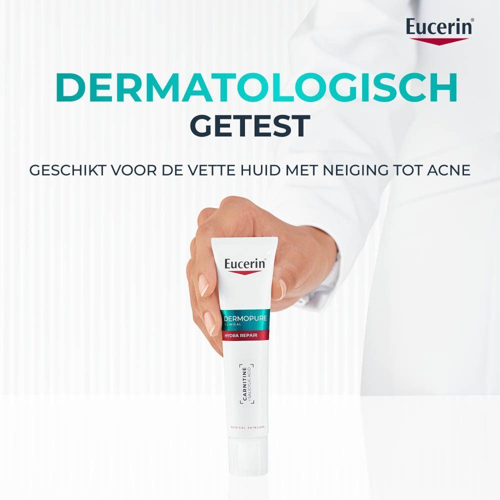 Hand met tube. Tekst: Dermatologisch getest. Geschikt voor de vette huid met neiging tot acne. Eucerin.