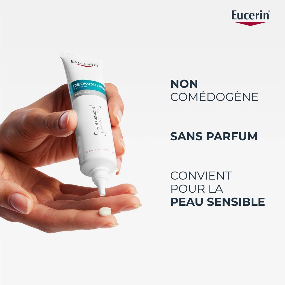 Main avec Eucerin Dermopure Clinical Peeling 10. Texte : Non comédogène, sans parfum, convient aux peaux sensibles.
