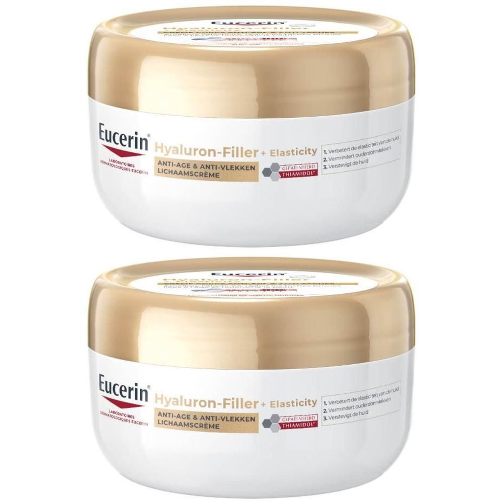 Twee potten crème Corps Anti-Âge & Anti-Vlekken. Gouden deksel, witte pot. Eucerin Hyaluron-Filler + Elasticity.