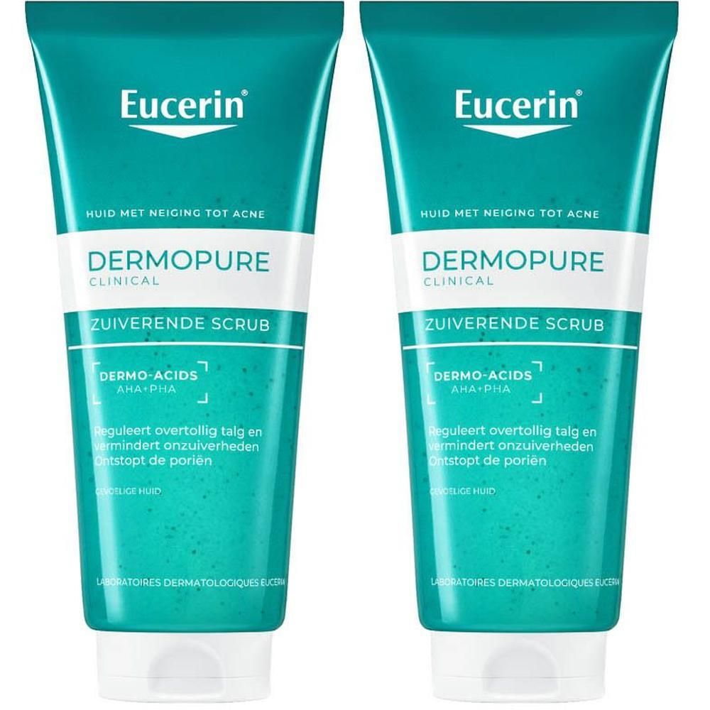 Twee tubes Eucerin DERMOPURE CLINICAL Zuiverende Scrub. Groen-witte verpakking, merk en naam zichtbaar.