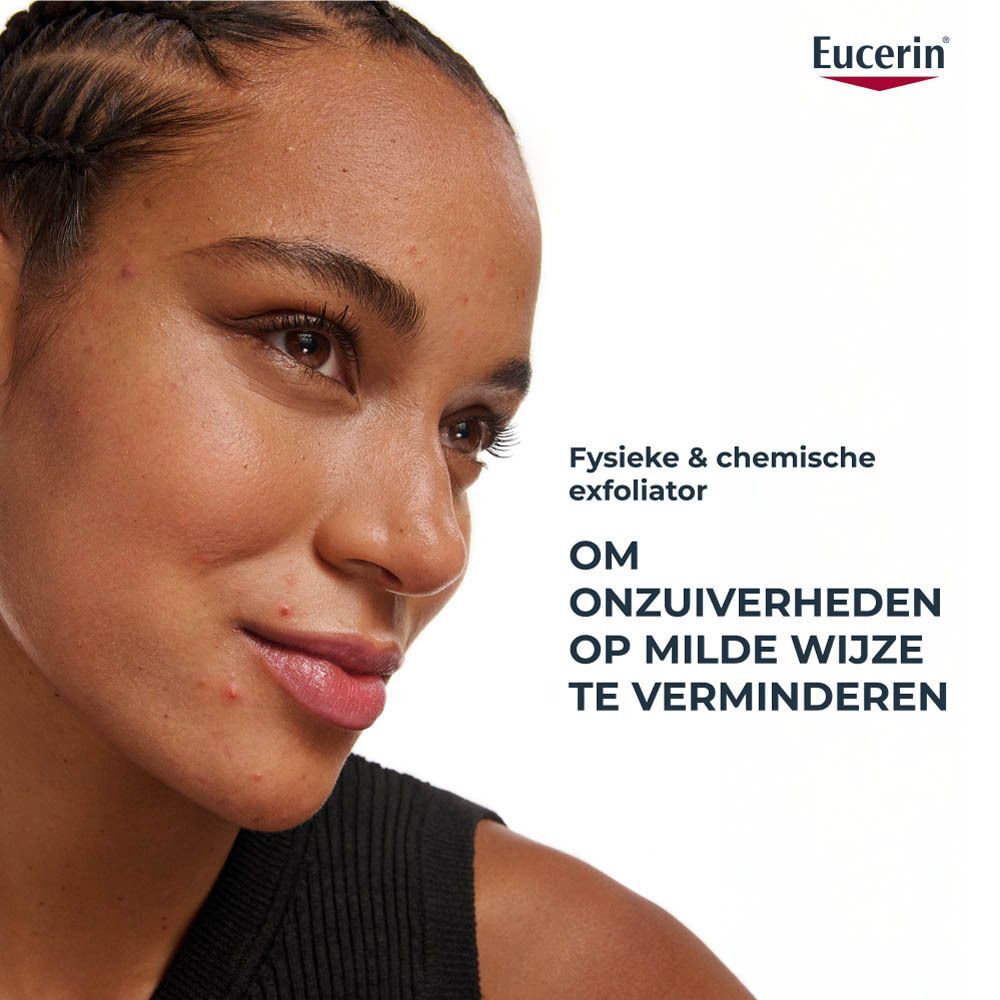 Vrouw met huidonzuiverheden. Tekst: Om onzuiverheden op milde wijze te verminderen. Eucerin logo zichtbaar.