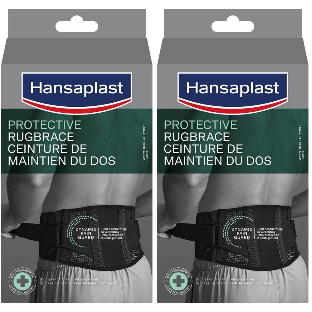 Twee Hansaplast rugbrace in verpakking. Zwarte riem met klittenbandsluiting, op grijze achtergrond.
