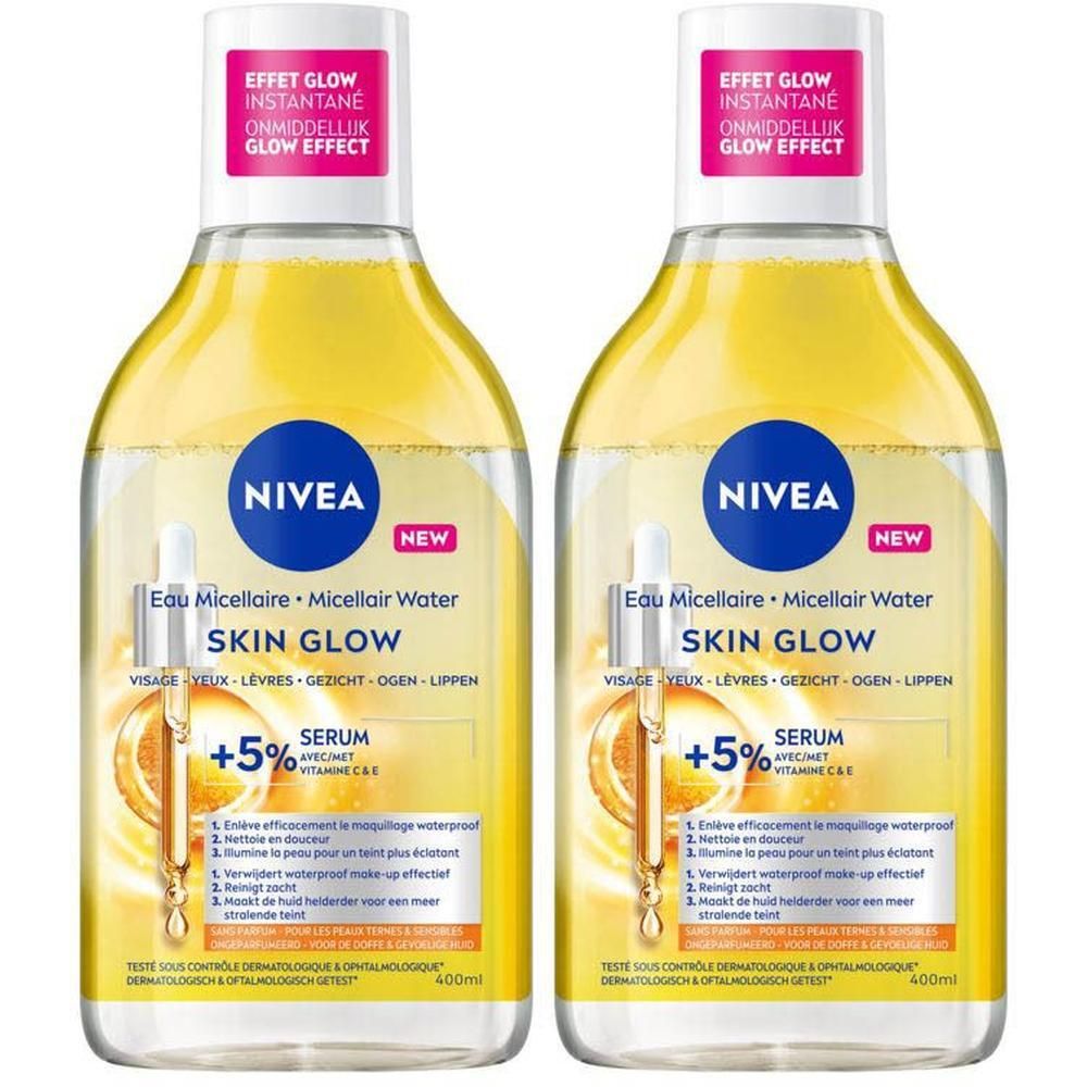 Deux flacons de Nivea Skin Glow Eau Micellaire. Liquide jaune, bouchon blanc, autocollant rose. Contient du sérum à la vitamine C. 400ml.