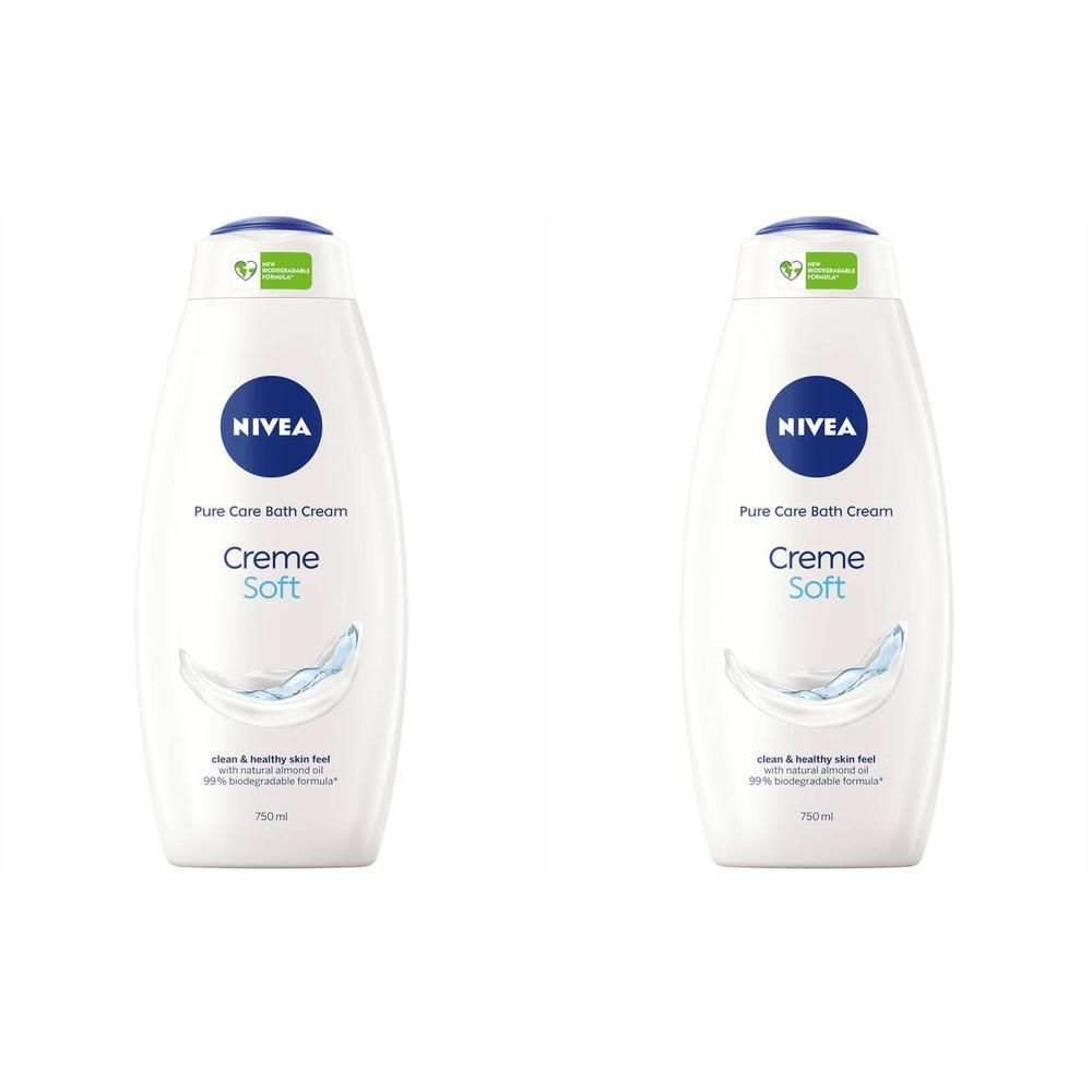 Twee witte flessen Nivea Soft Crème de Bain. Blauwe dop, blauw logo, tekst Creme Soft. Golfgrafiek.