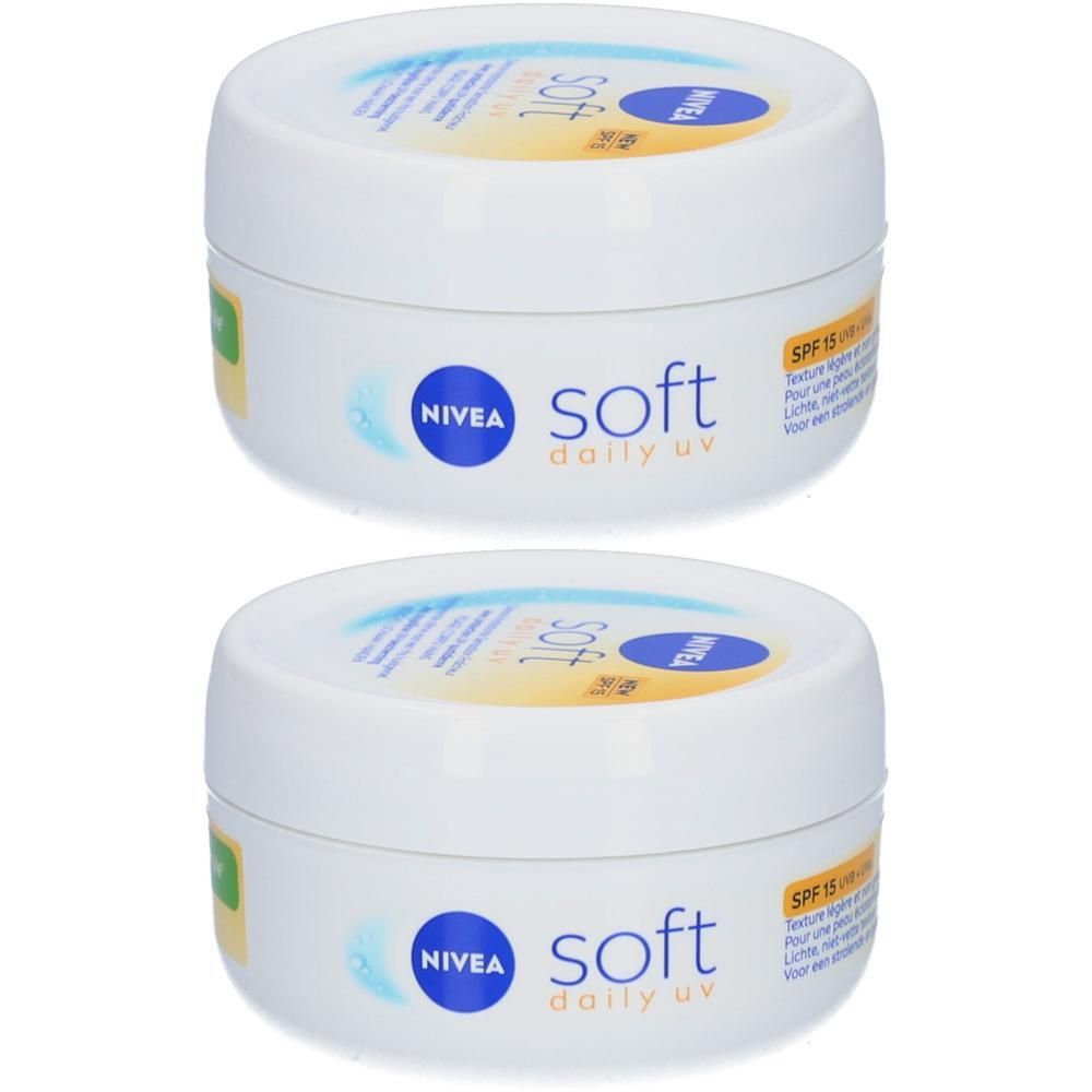 Twee witte potten met deksels. Opschrift: Nivea Soft Daily UV SPF15. Blauwe en gele elementen.