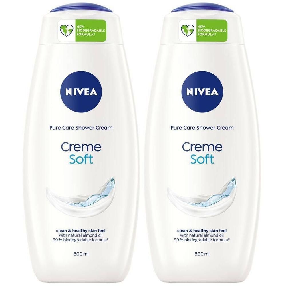 Deux flacons blancs de Nivea Crème Soft Crème de Douche. Bouchons bleus, logos bleus. Texte: Pure Care Shower Cream, Creme Soft, 500 ml.