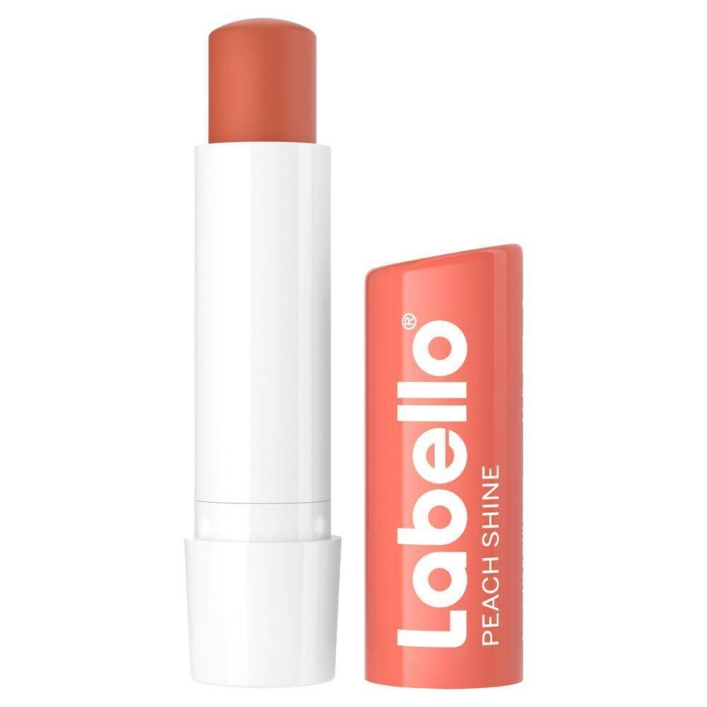Labello® Peach Shine lippenstift, geopend. Roze lippenstift, witte huls. Opschrift: Labello, Peach Shine.