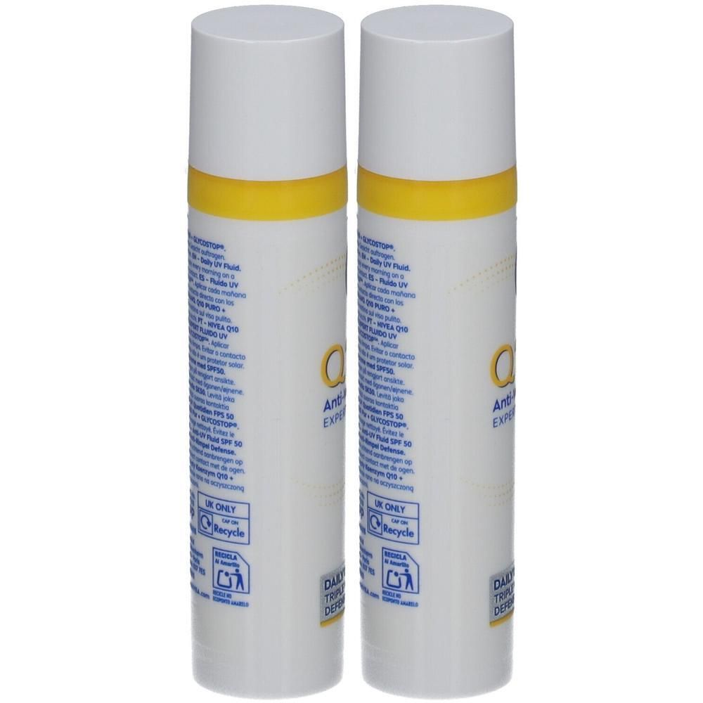 Deux flacons spray blancs avec des accents jaunes. Inscription: Nivea Q10 Anti-Rides Expert SPF50. Emballage du produit.