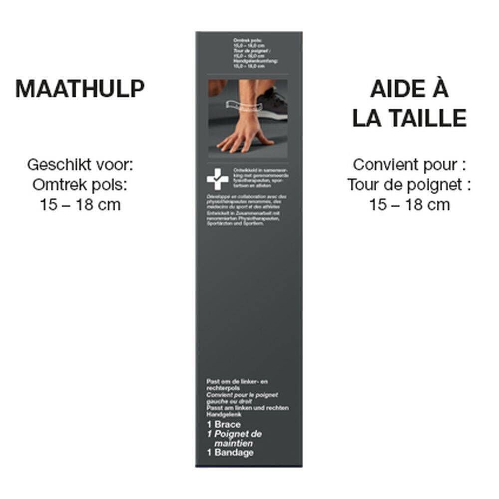 Achterkant van de verpakking. Tekst: Maathulp, Aide à la taille. Geschikt voor polsomtrek 15-18 cm. 1 Brace, 1 Poignet de maintien.