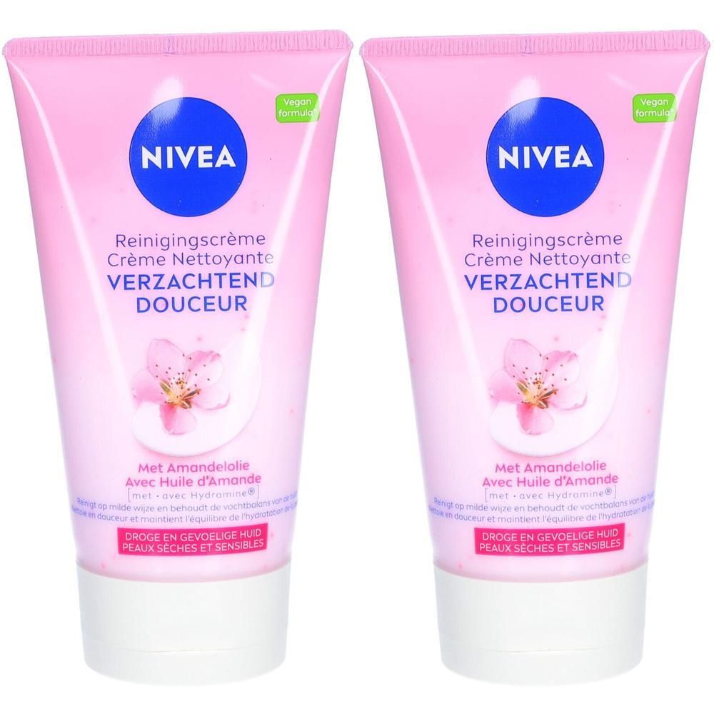 Twee roze tubes NIVEA reinigingscrème. Opschrift: VERZACHTEND DOUCEUR. Met amandelolie. Voor droge en gevoelige huid.
