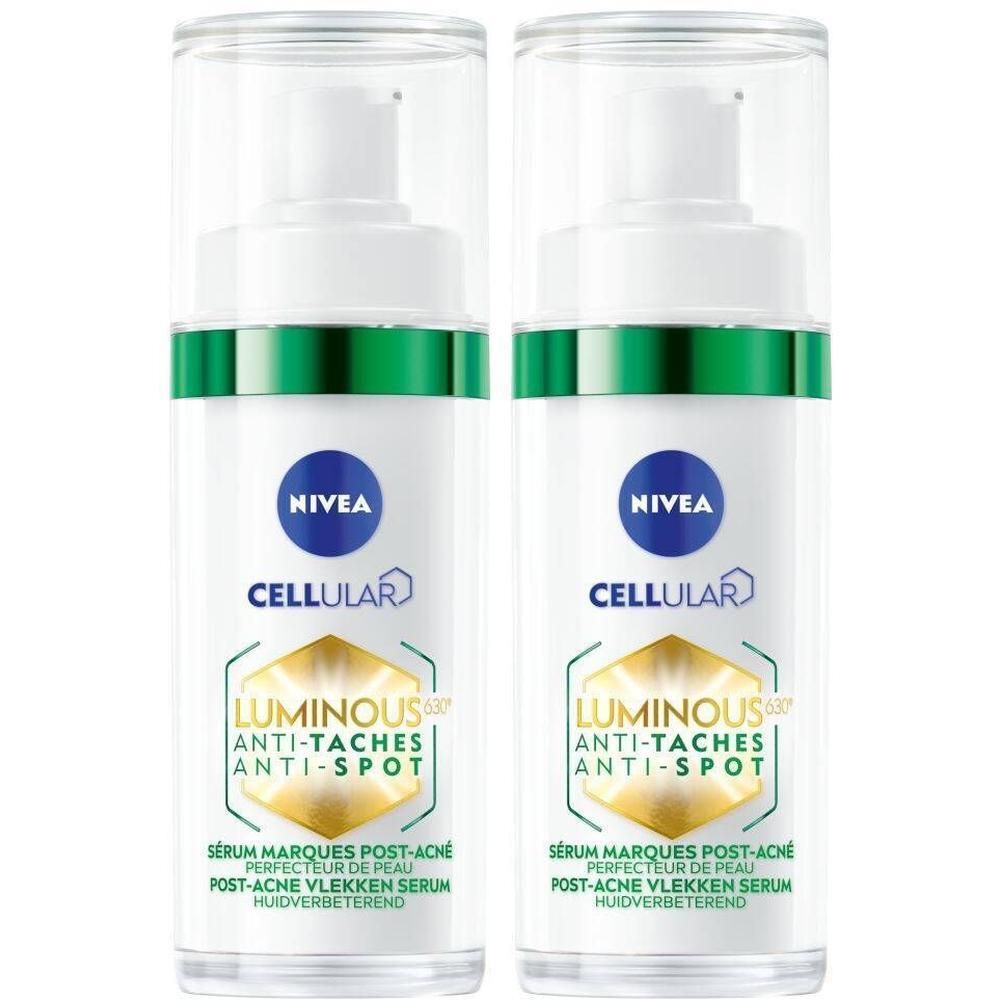 Twee witte flacons Nivea Cellular Luminous 630° Anti-Taches Anti-Spot. Blauwe dop, groene band, gouden tekst.