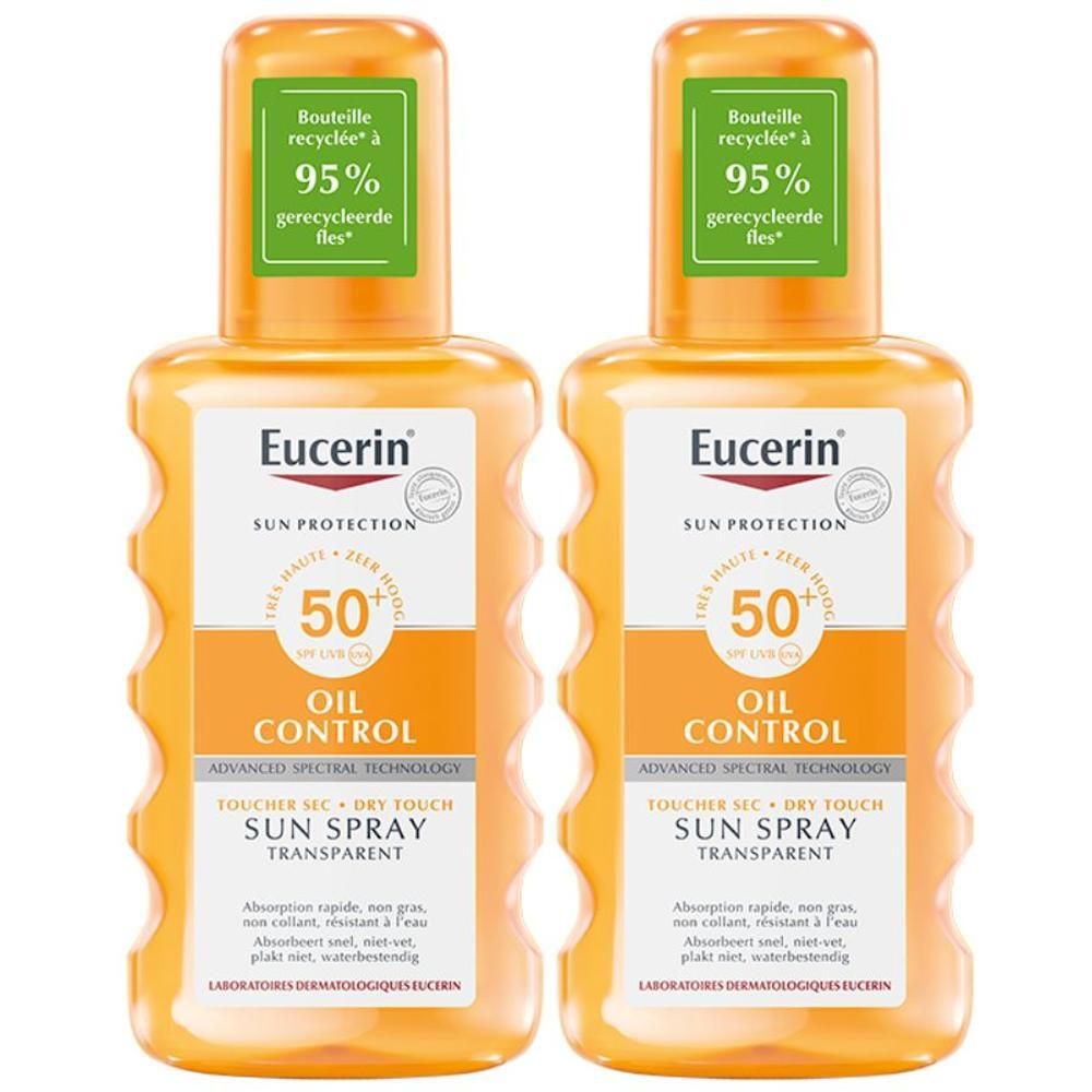 Deux flacons de Eucerin Sun Oil Control SPF 50+ Dry Touch Spray Transparent. Flacons oranges avec étiquettes vertes.