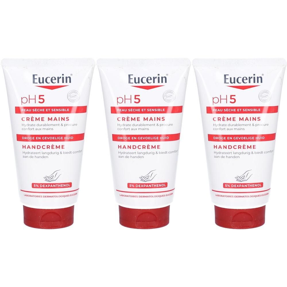 Trois tubes de crème pour les mains Eucerin pH5. Tubes blancs avec texte et bouchon rouges. Texte: Crème Mains, Handcrème.