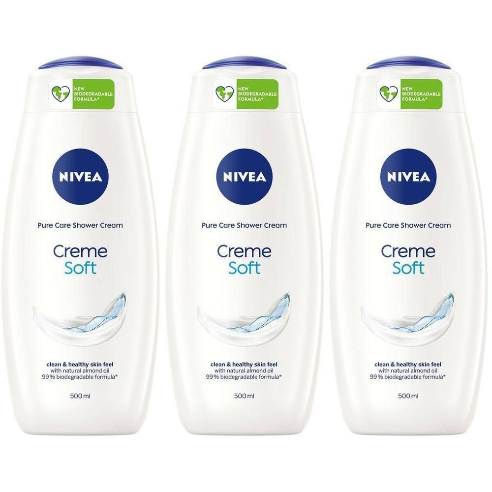 Drie witte flessen douchecrème. Blauwe doppen, blauwe logo's met NIVEA. Opschrift Creme Soft. 500ml.