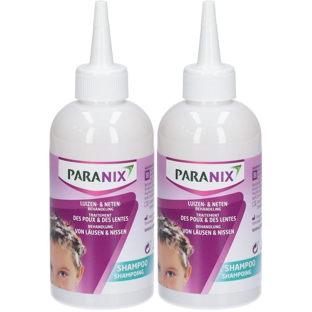 Twee witte flessen met witte dop en paars etiket. Opschrift: Paranix, Shampooing, behandeling tegen luizen en neten.