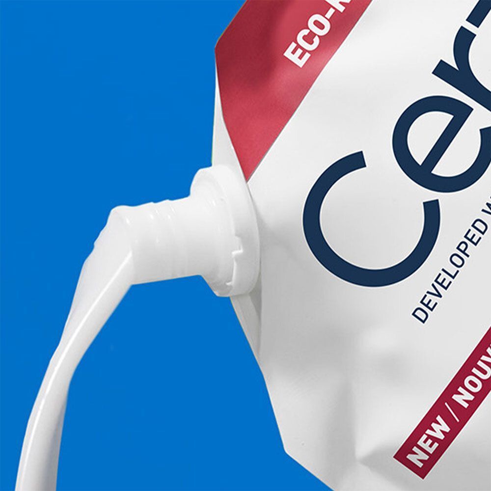 Le produit est versé de la recharge. Produit blanc. Accents bleus et rouges.