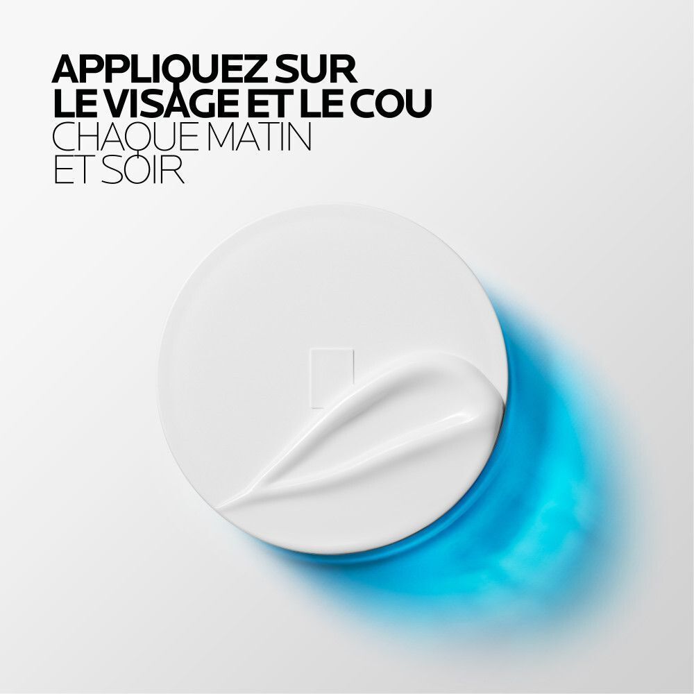 Couvercle blanc avec crème. Texte: APPLIQUEZ SUR LE VISAGE ET LE COU CHAQUE MATIN ET SOIR. Fond bleu.