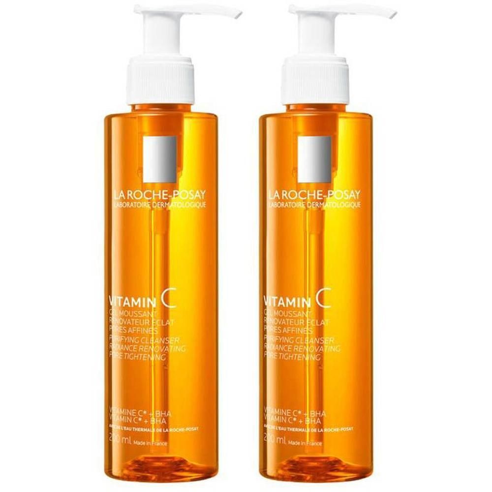 Twee flessen La Roche-Posay Gel Moussant Purifiant à la Vitamine C. Oranje flessen met witte pomp. Tekst: Vitamin C, Clarifiant.