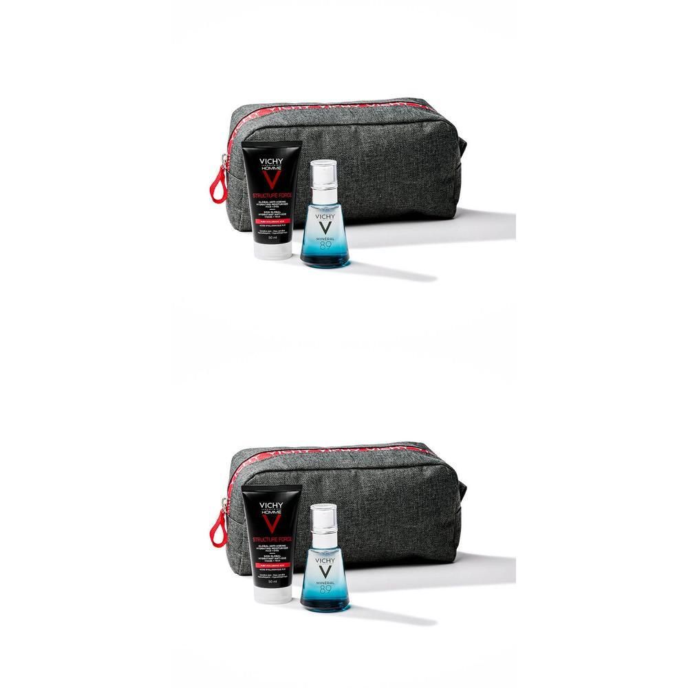 Trousse de toilette avec produits. Comprend un tube, un flacon et une trousse grise avec fermeture éclair rouge.
