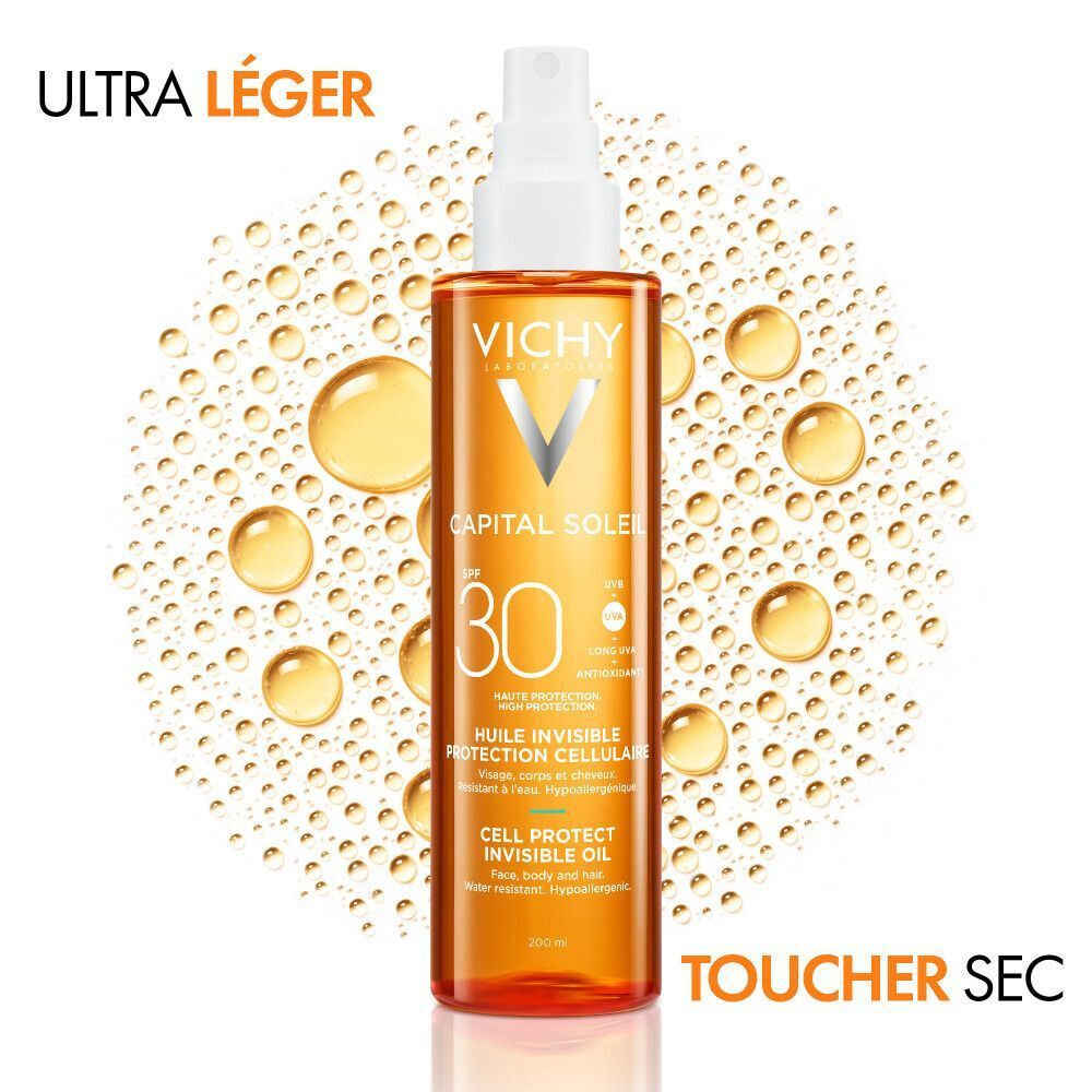 Flacon Vichy Capital Soleil SPF30. Texte: Ultra léger, toucher sec. Gouttes jaunes.