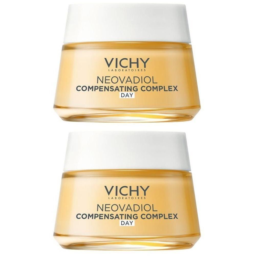 Deux pots de crème de jour Vichy Neovadiol. Crème jaunâtre dans des pots en verre, couvercle blanc. Logo Vichy.