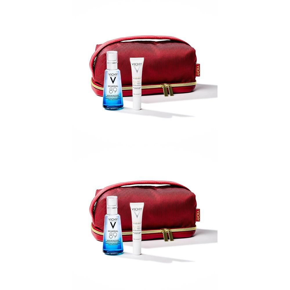 Rode toilettas met twee producten: blauwe fles, witte tube. Merk Vichy zichtbaar.