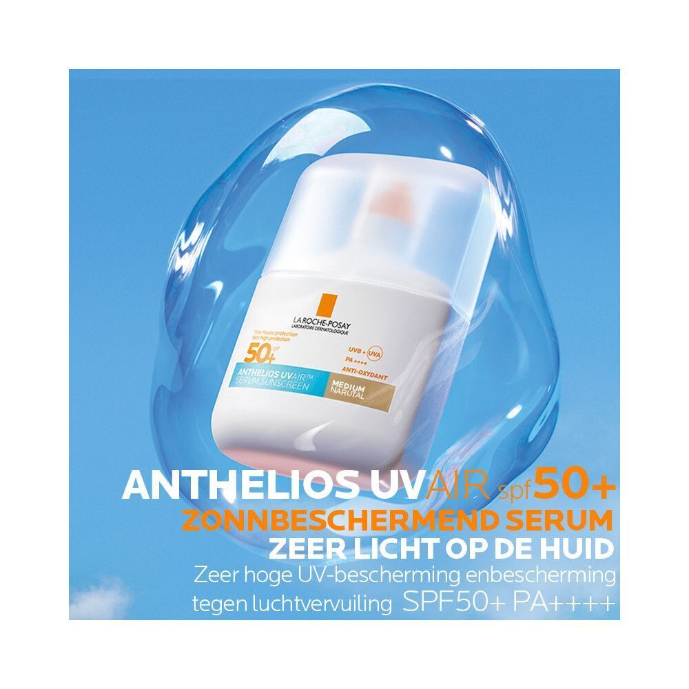 La Roche-Posay Anthelios UVAIR SPF50+ Serum Solaire. Fles in een blauwe bel. Blauwe achtergrond.