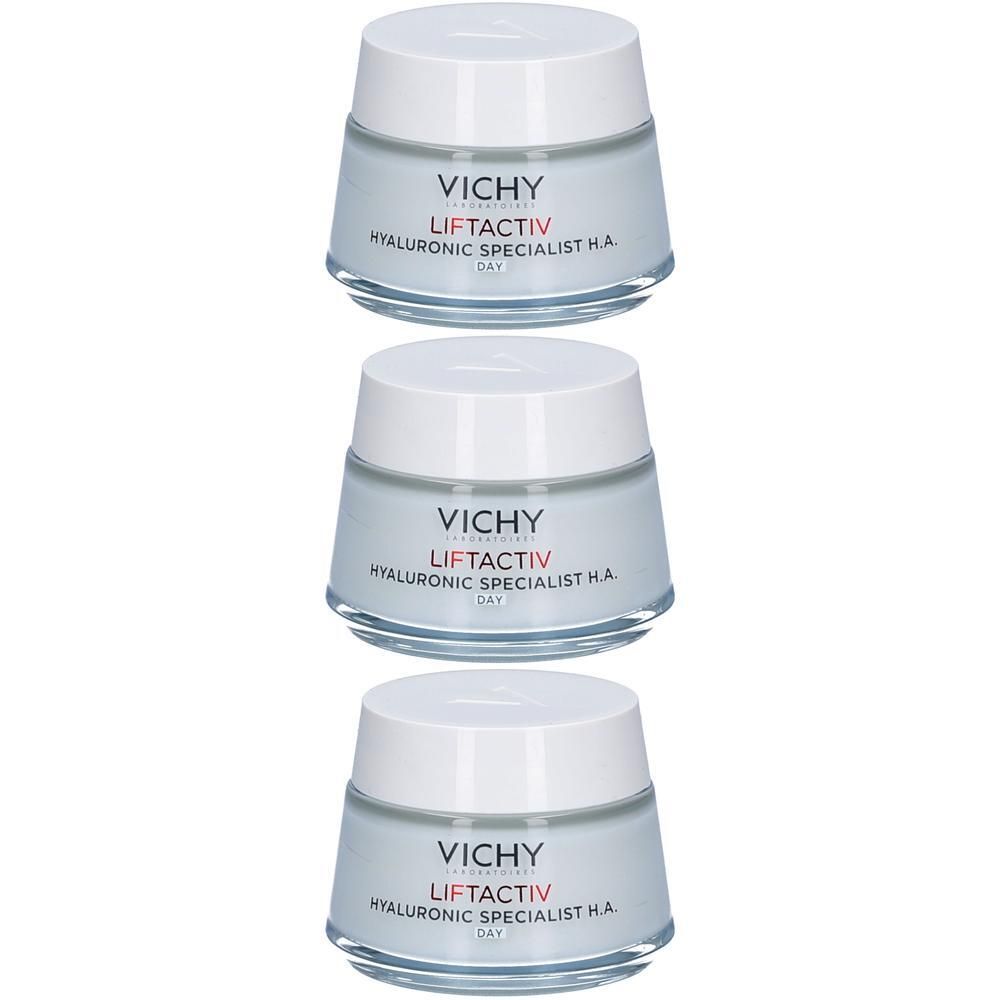 Trois pots de crème avec couvercles blancs. Inscription: VICHY LIFTACTIV HYALURONIC SPECIALIST H.A. DAY. Récipients en verre.