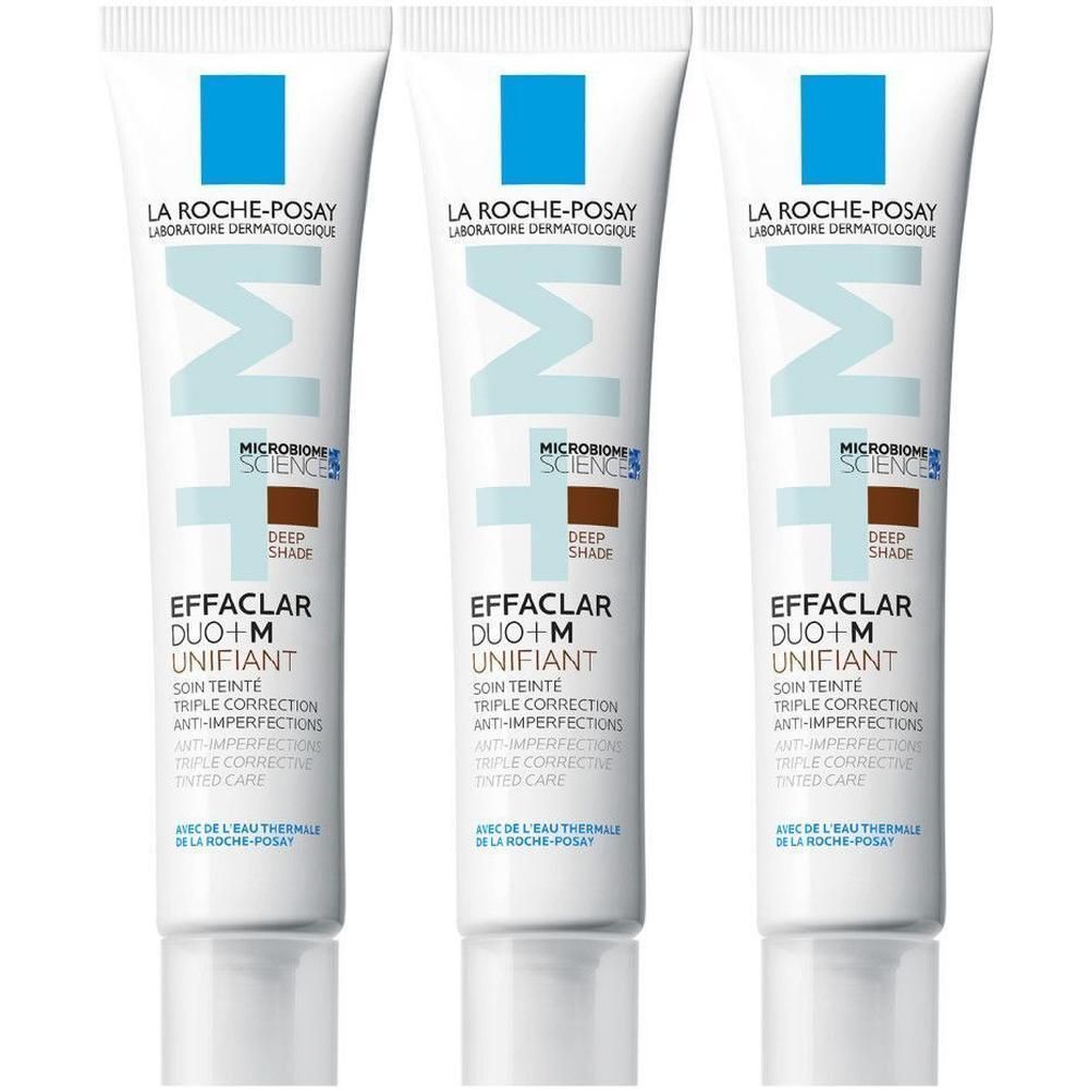 Trois tubes La Roche-Posay Effaclar Duo+M, soin teinté, Deep Shade. Blanc, avec marquages bleus et marron.