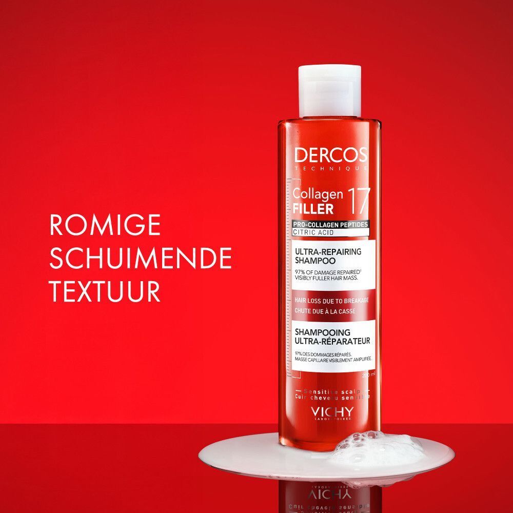 Shampoo fles op wit oppervlak. Tekst: Dercos, Collagen 17 Filler, Ultra-Reparateur, Romige schuimende textuur.