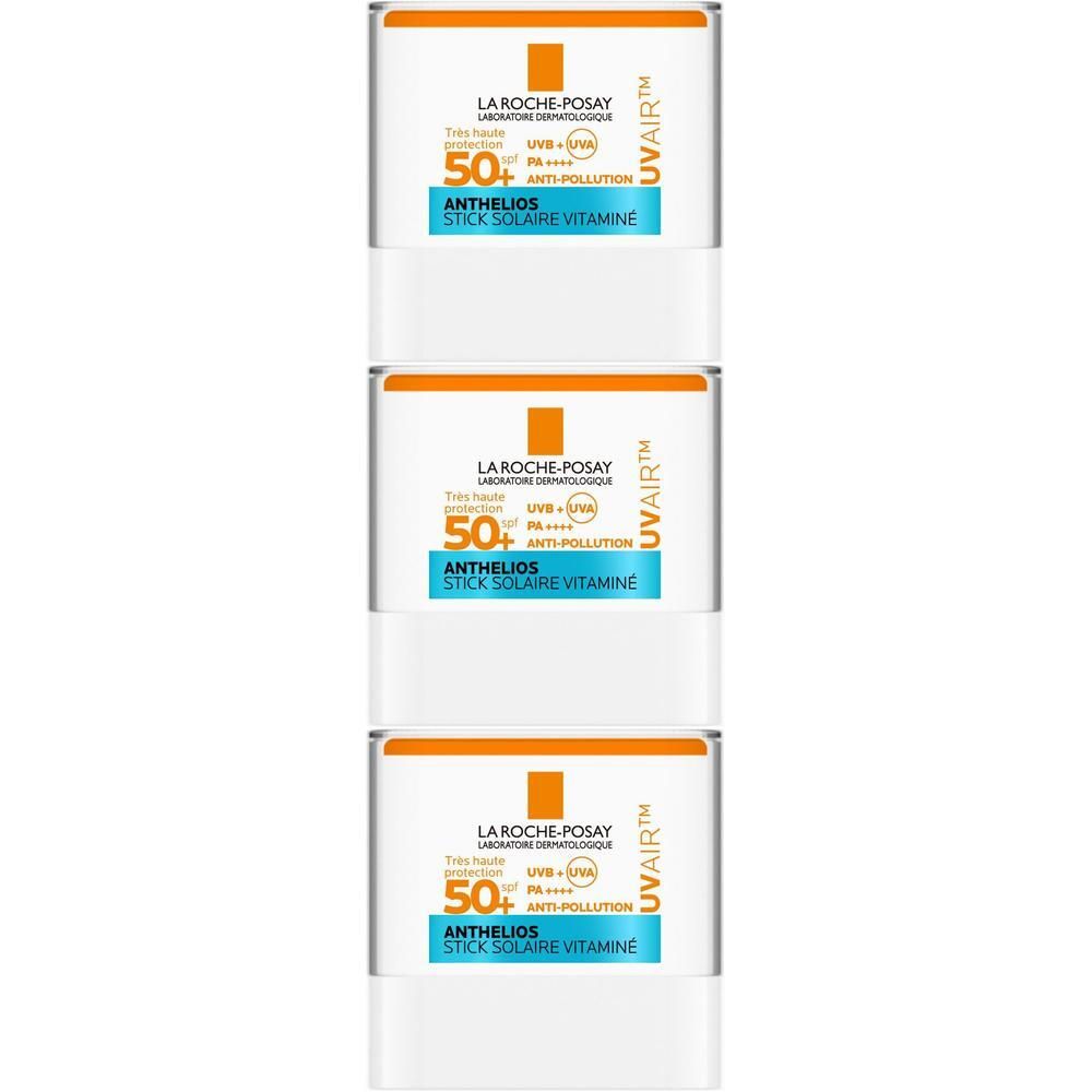 Trois sticks solaires La Roche-Posay Anthelios UVair. Blanc, couvercle orange, texte bleu.
