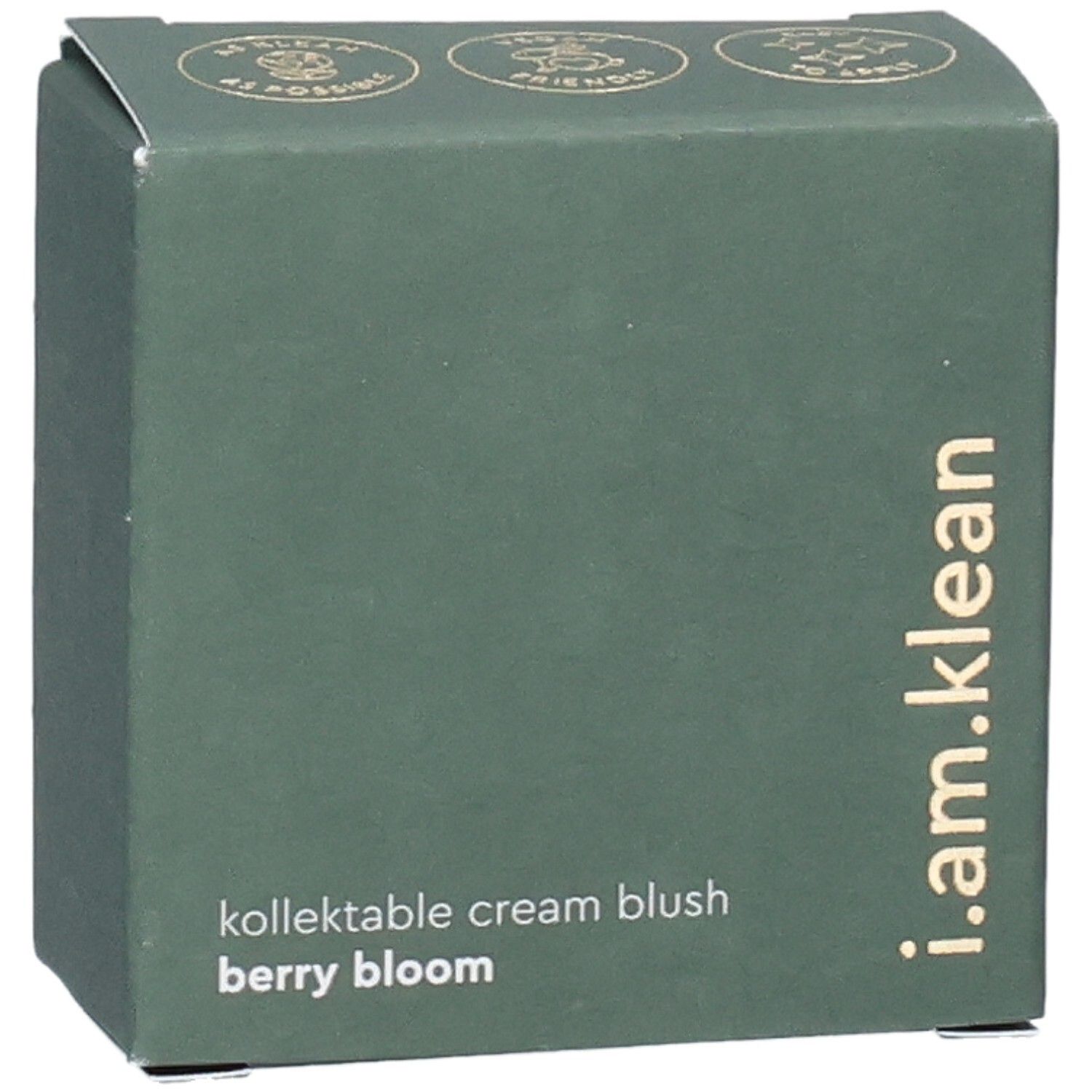 Boîte verte. Inscription : i.am.klean, kollektable cream blush berry bloom. Logos en haut.