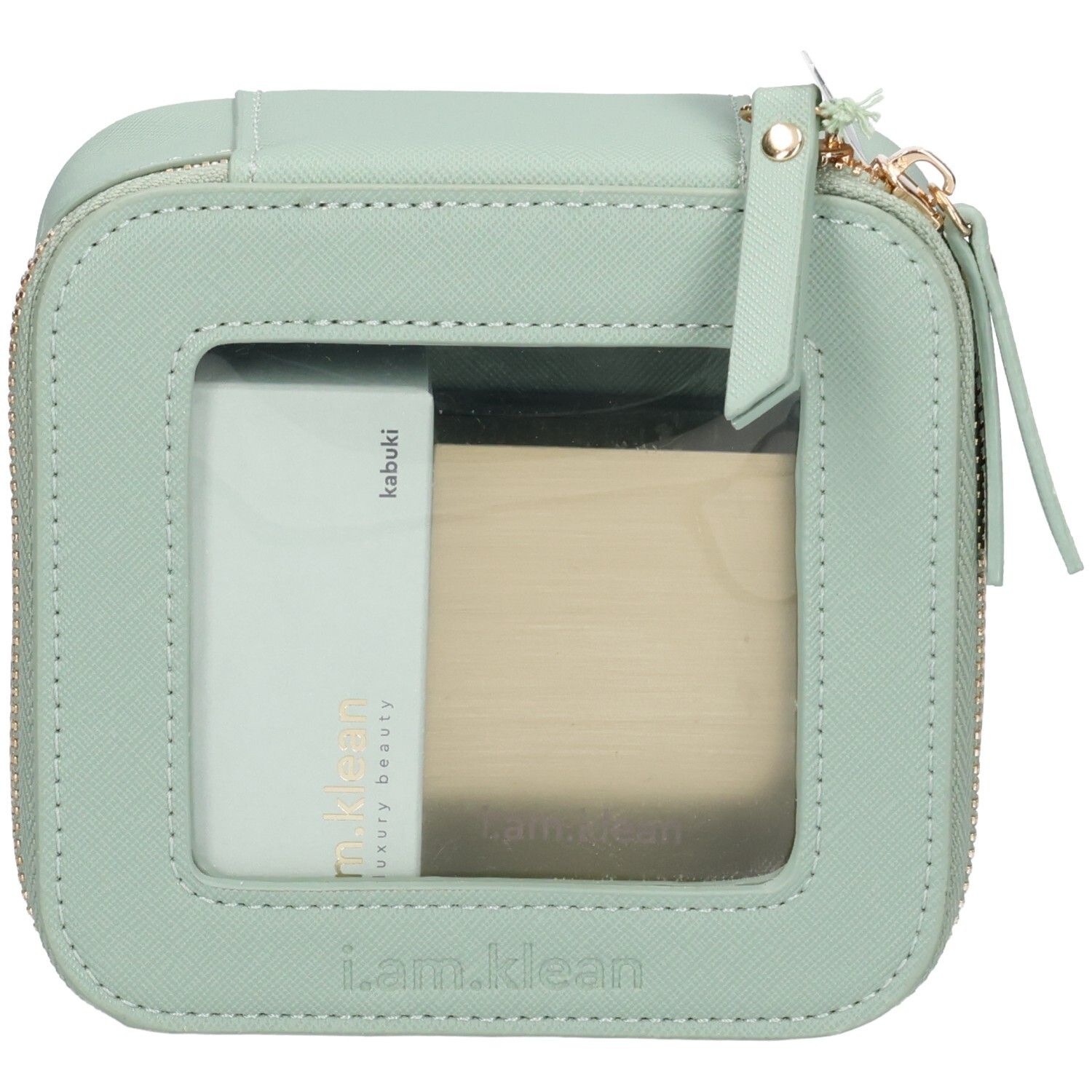Trousse de maquillage vert clair avec fermeture éclair et fenêtre. Contient une poudre et un pinceau. Inscription : i.am.klean, kabuki.