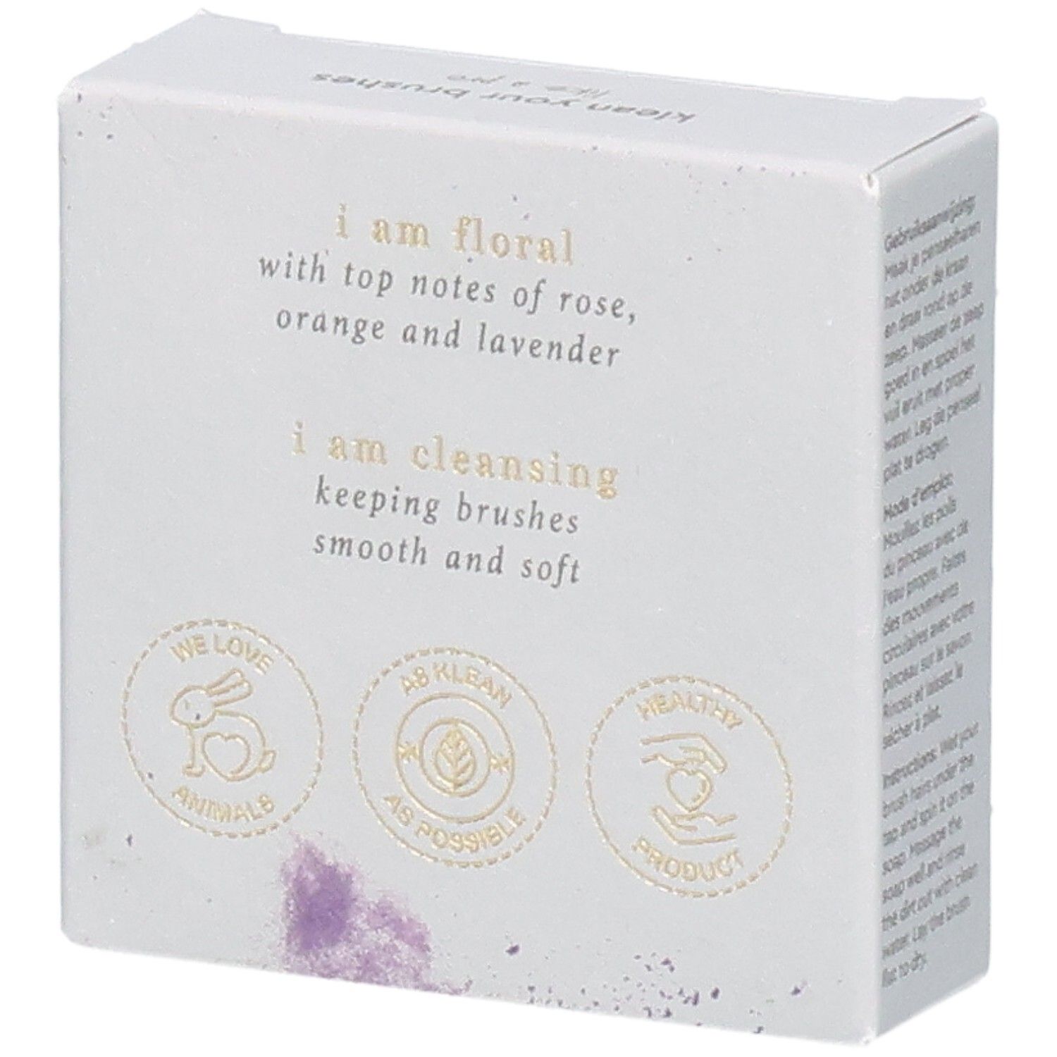 Kartonnen verpakking met bloemmotief en tekst: i am floral, i am cleansing. Logo's: We love animals, AB klean, Healthy product.