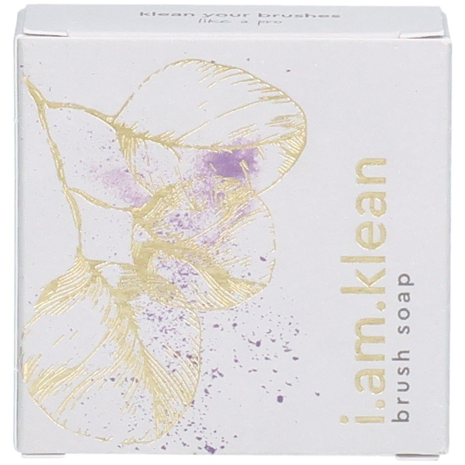 Kartonnen verpakking met bloemmotief en productnaam i.am.klean Brush Soap. Bovenaanzicht.