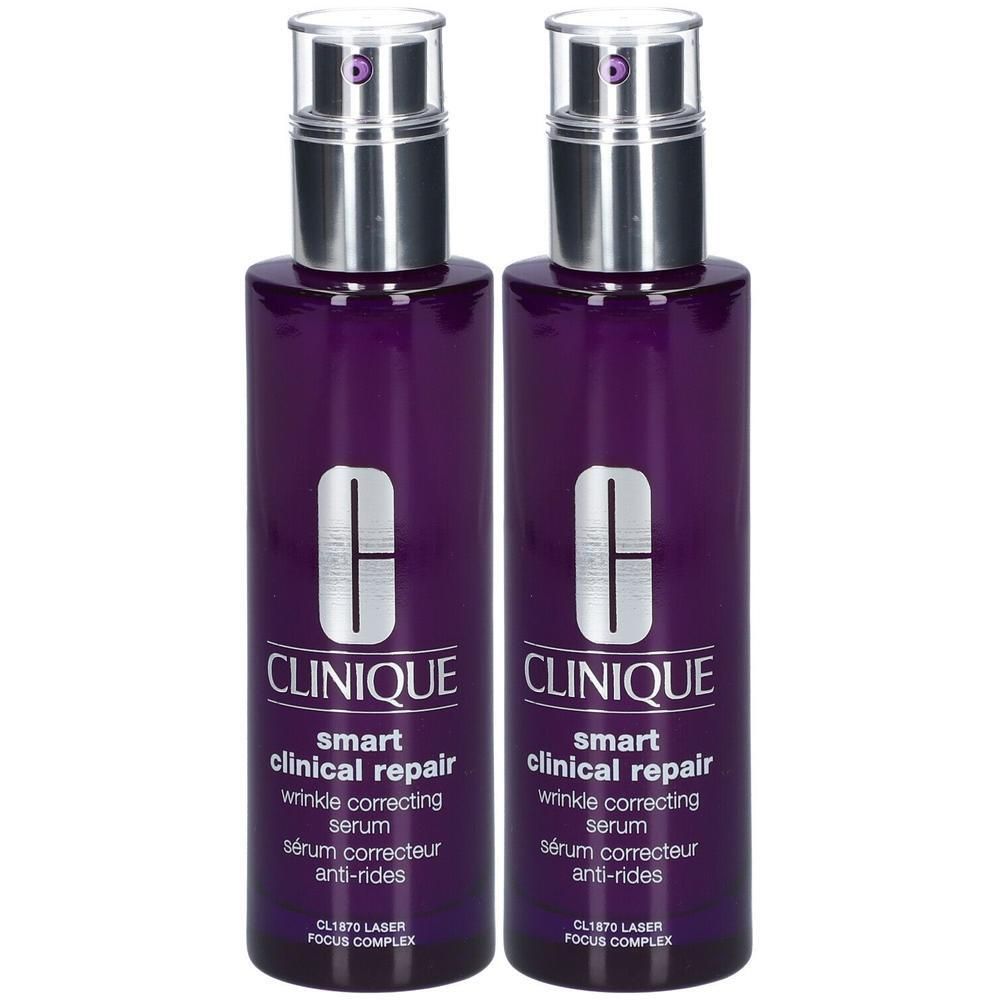 Twee serumflessen met zilveren pompkopjes. Opschrift: CLINIQUE, Smart Clinical Repair, anti-rimpelserum.