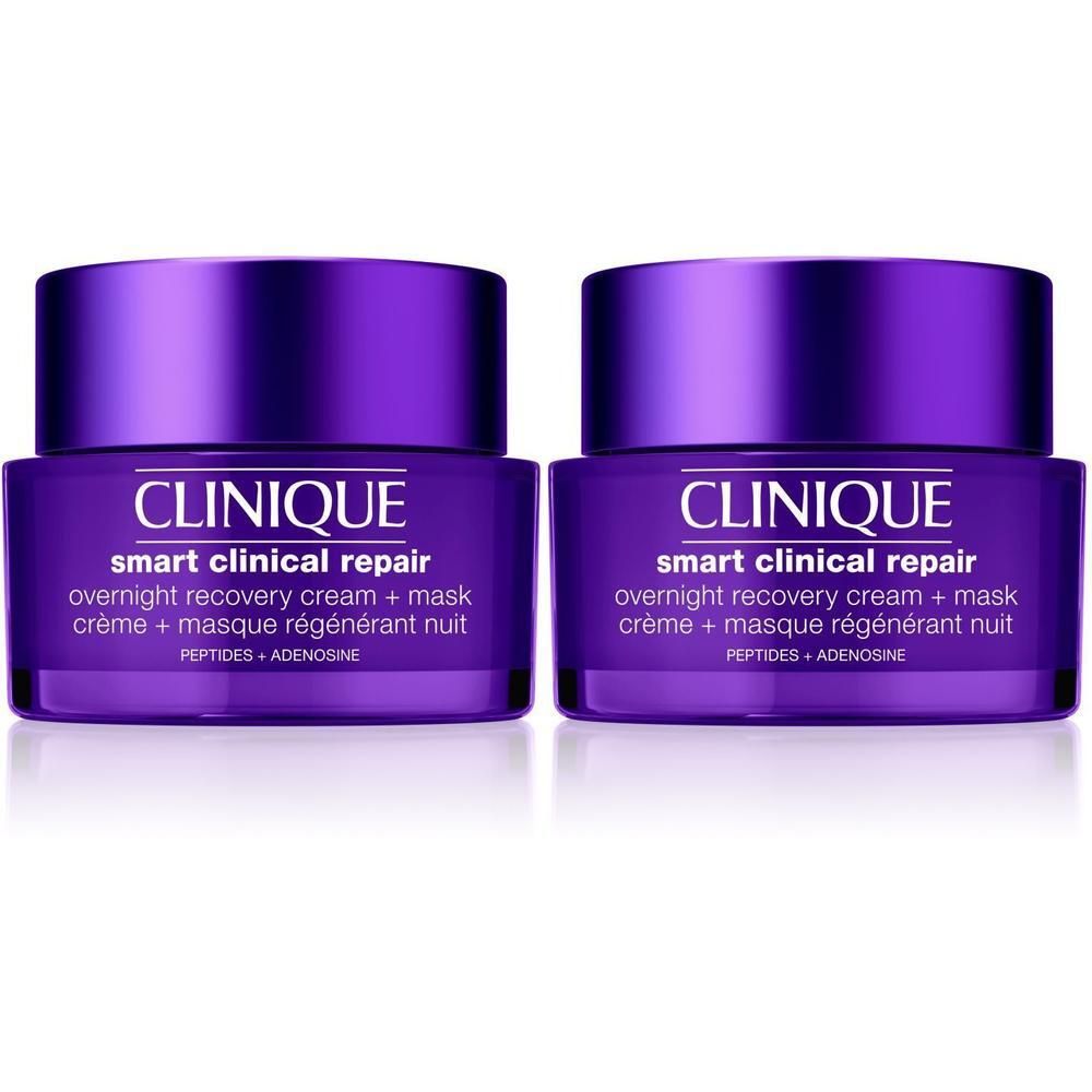 Deux pots violets avec couvercles. Inscription: Clinique Smart Clinical Repair, crème + masque nuit. Texte blanc.