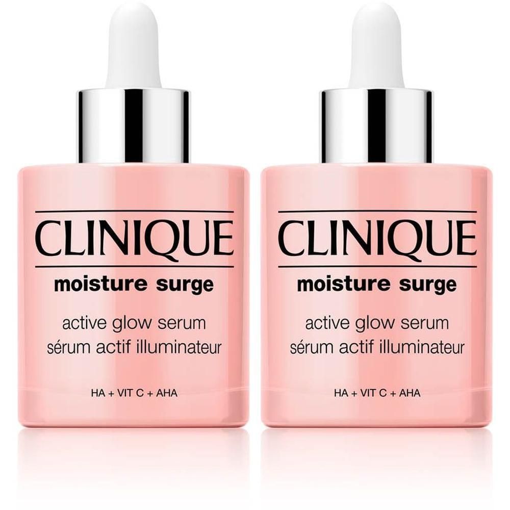 Twee roze flacons met pipet. Opschrift CLINIQUE, moisture surge, active glow serum, sérum actif illuminateur. HA + VIT C + AHA.