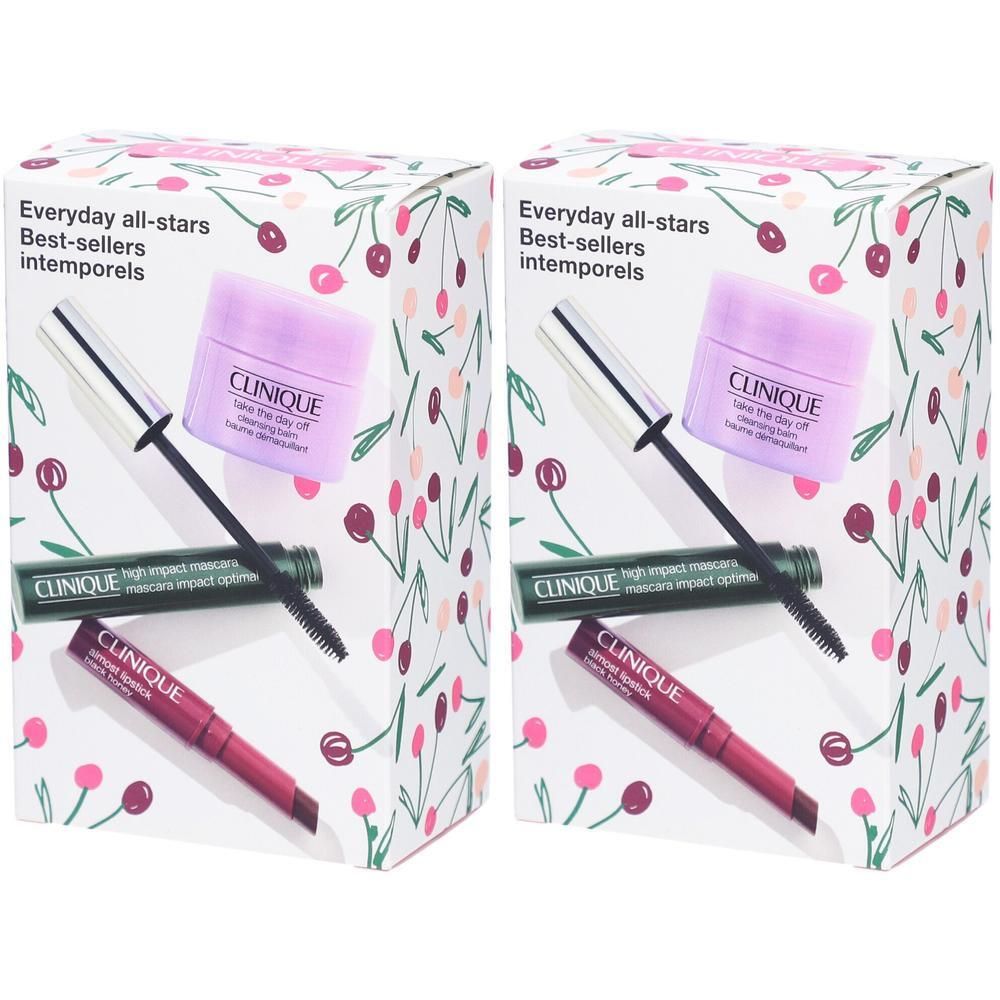 Coffret de cosmétiques Clinique avec mascara, rouge à lèvres et crème pour les yeux sur boîte blanche à motif cerises.