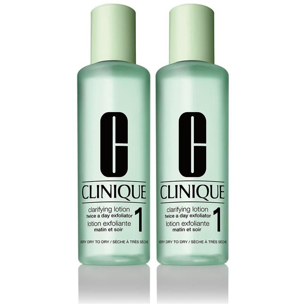 Twee flacons Clinique Clarifying Lotion 1 met lichtgroene doppen en Clinique logo.