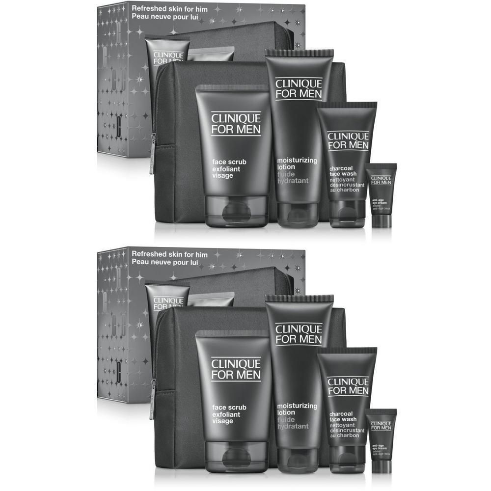 Coffret de produits cosmétiques pour hommes. Plusieurs tubes et une trousse de toilette noire. Emballage avec motif d'étoiles.